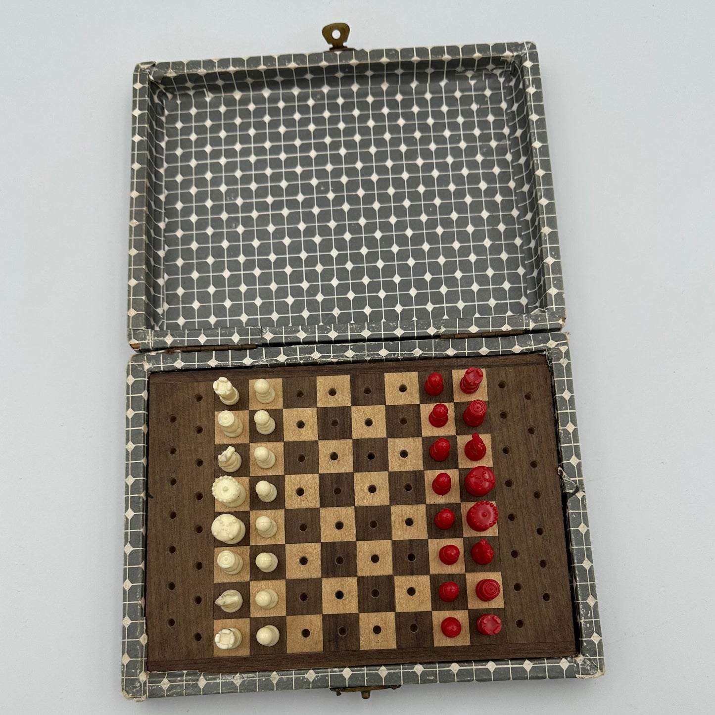 1970s pegged travel set with wooden board and geometric pattern wood case