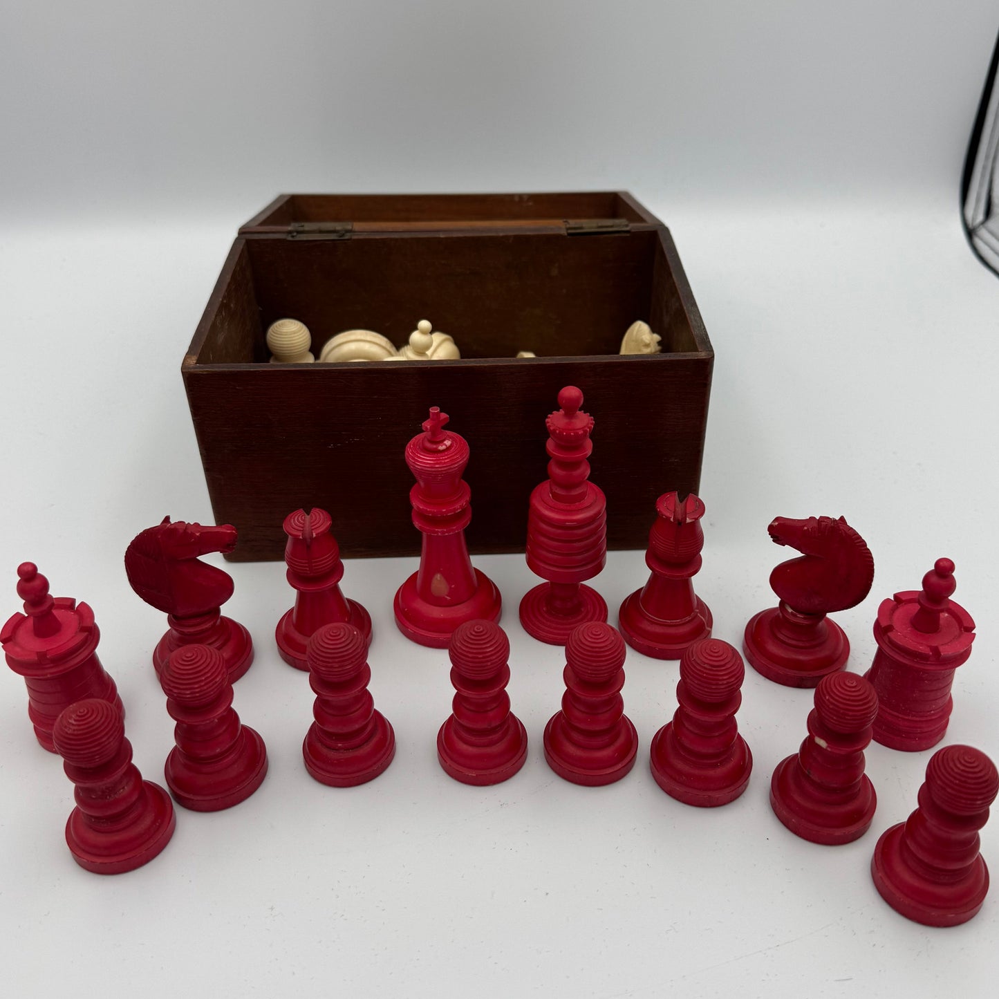 19th century red and cream bone barleycorn chess pieces