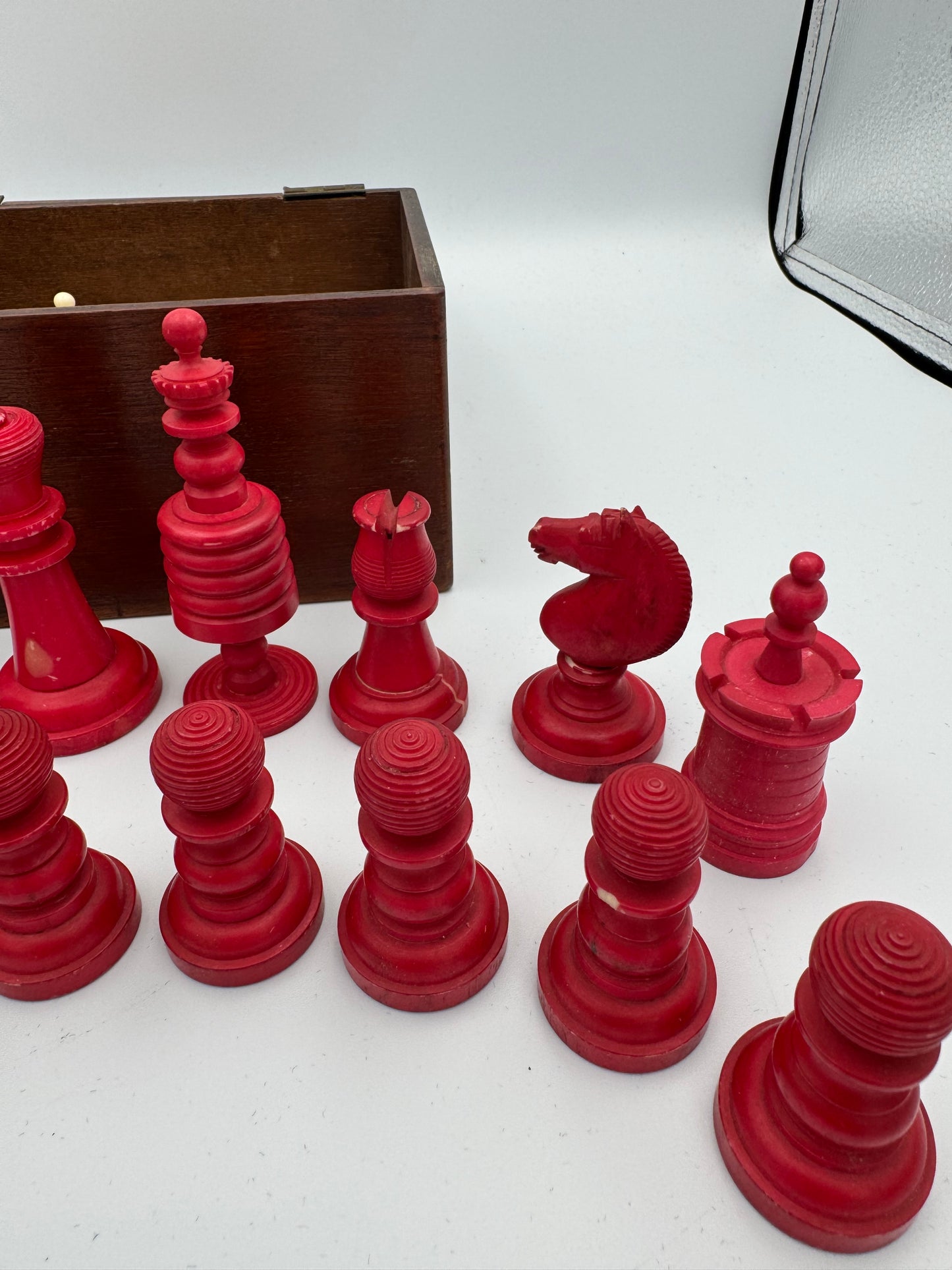 19th century red and cream bone barleycorn chess pieces