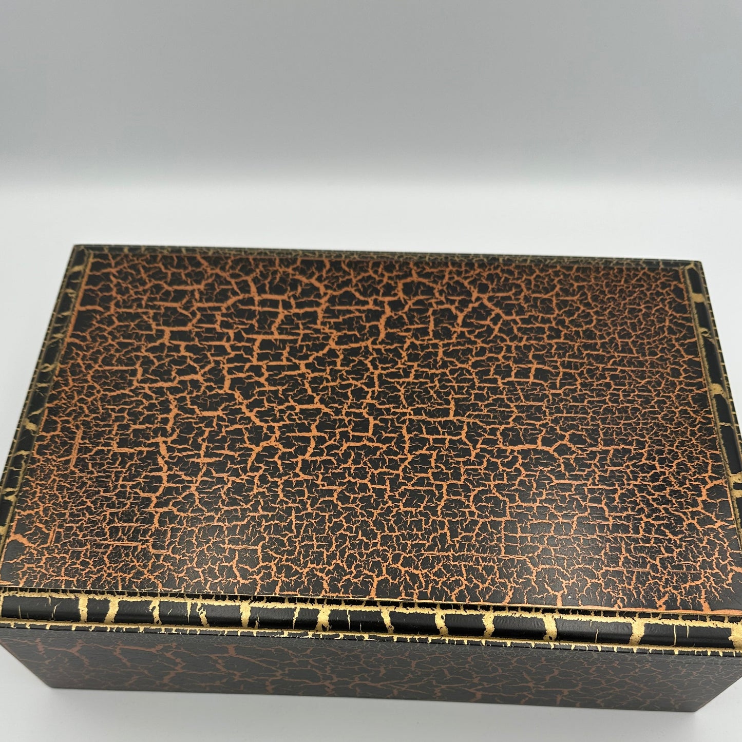 Staunton style chess pieces with bronze and gold crackle paint effect and matching box