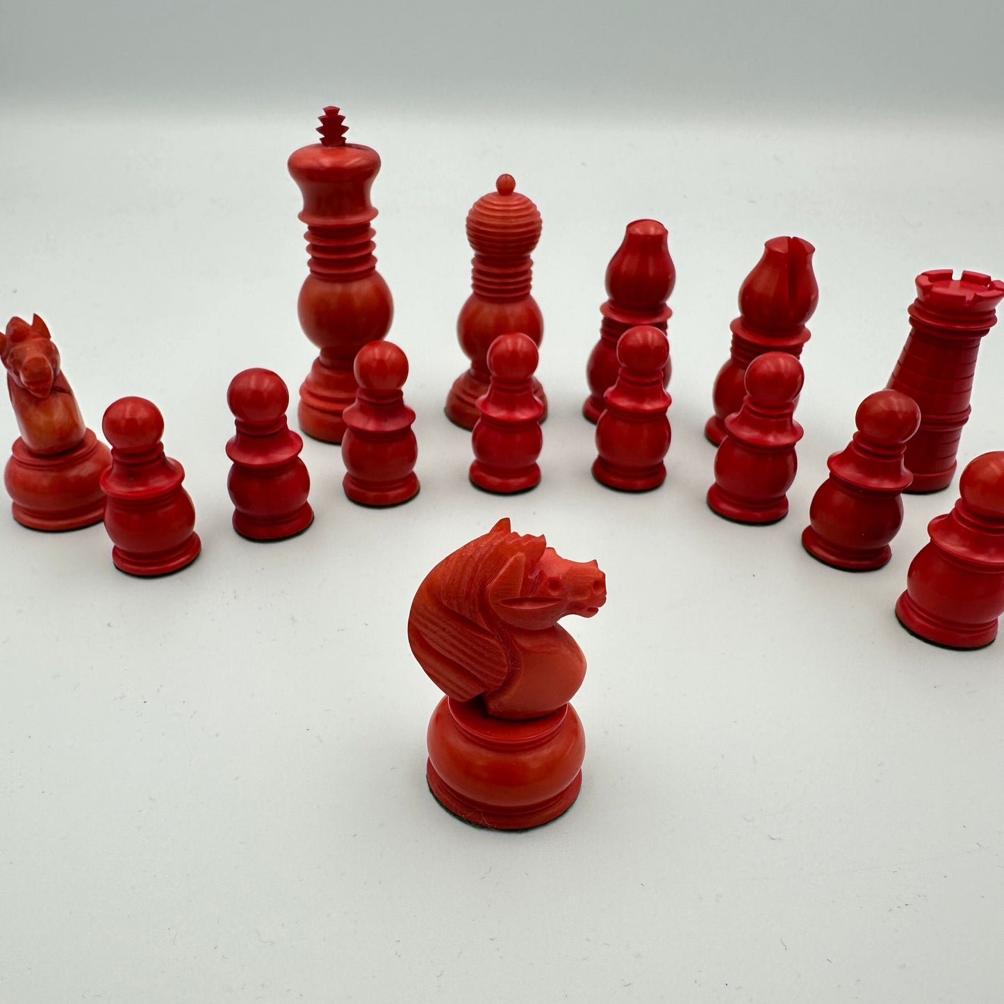 Antique Tagua nut red and cream chess pieces