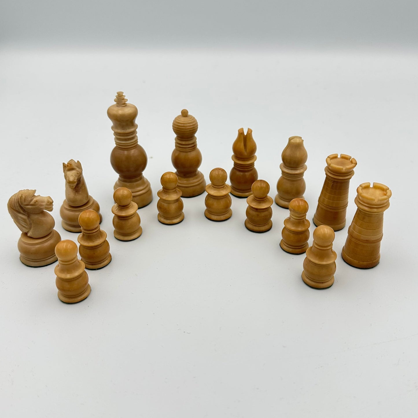 Antique Tagua nut red and cream chess pieces