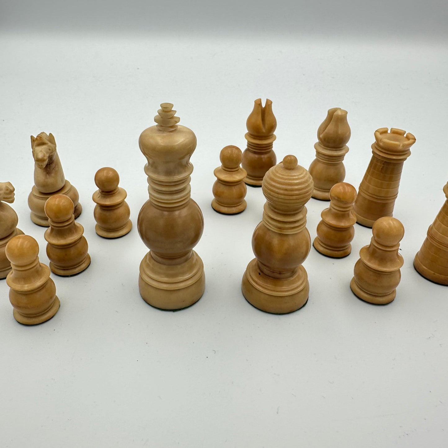 Antique Tagua nut red and cream chess pieces