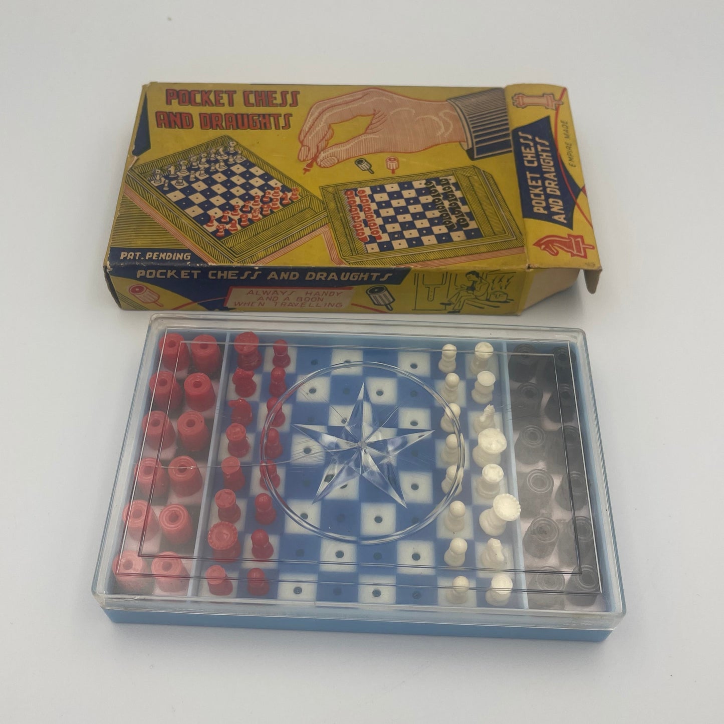 Vintage pocket chess and draughts set in original packaging