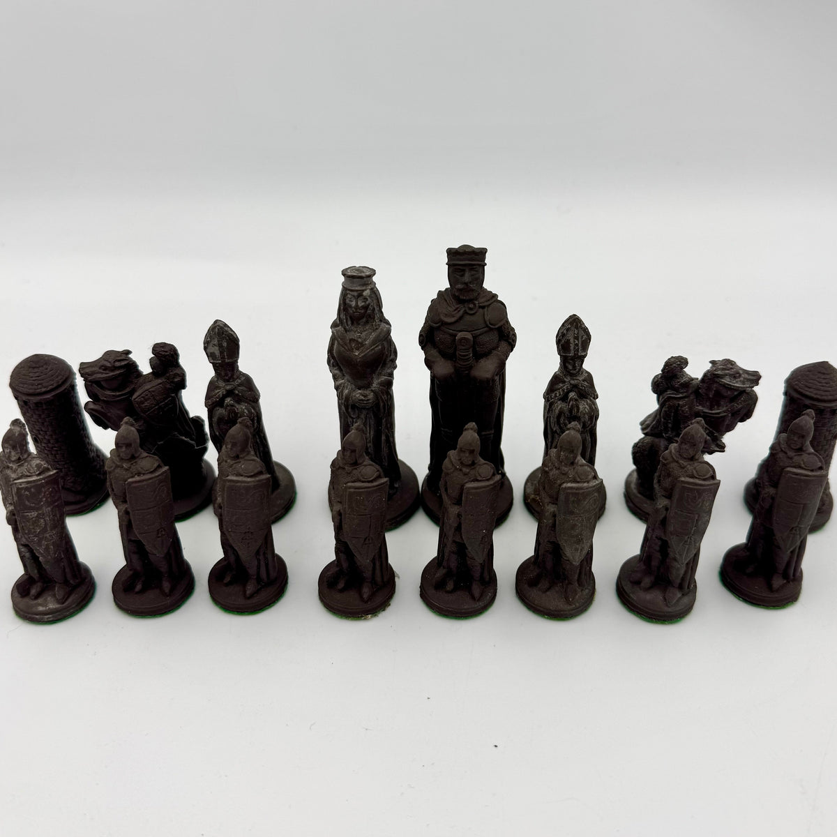 Camelot chess pieces hand carved from Cornish clay and Welsh slate