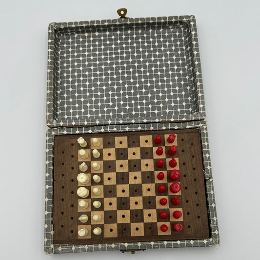 1970s  pegged travel set with wooden board and geometric pattern wood case