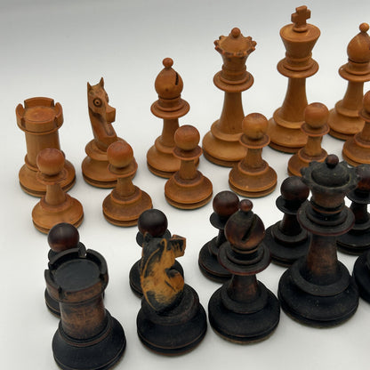 Antique dogfaced knight Staunton style chess pieces in wooden box