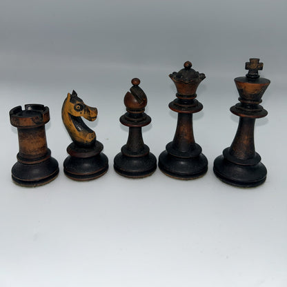 Antique dogfaced knight Staunton style chess pieces in wooden box