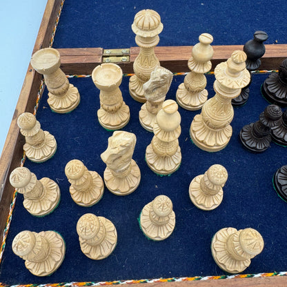 Vintage wooden lotus design chess pieces in wooden folding chess board