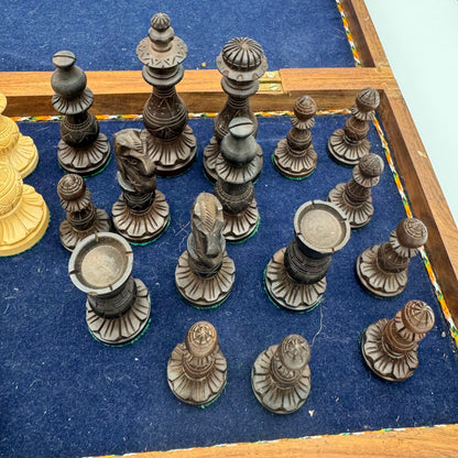 Vintage wooden lotus design chess pieces in wooden folding chess board