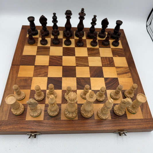 Vintage wooden lotus design chess pieces in wooden folding chess board