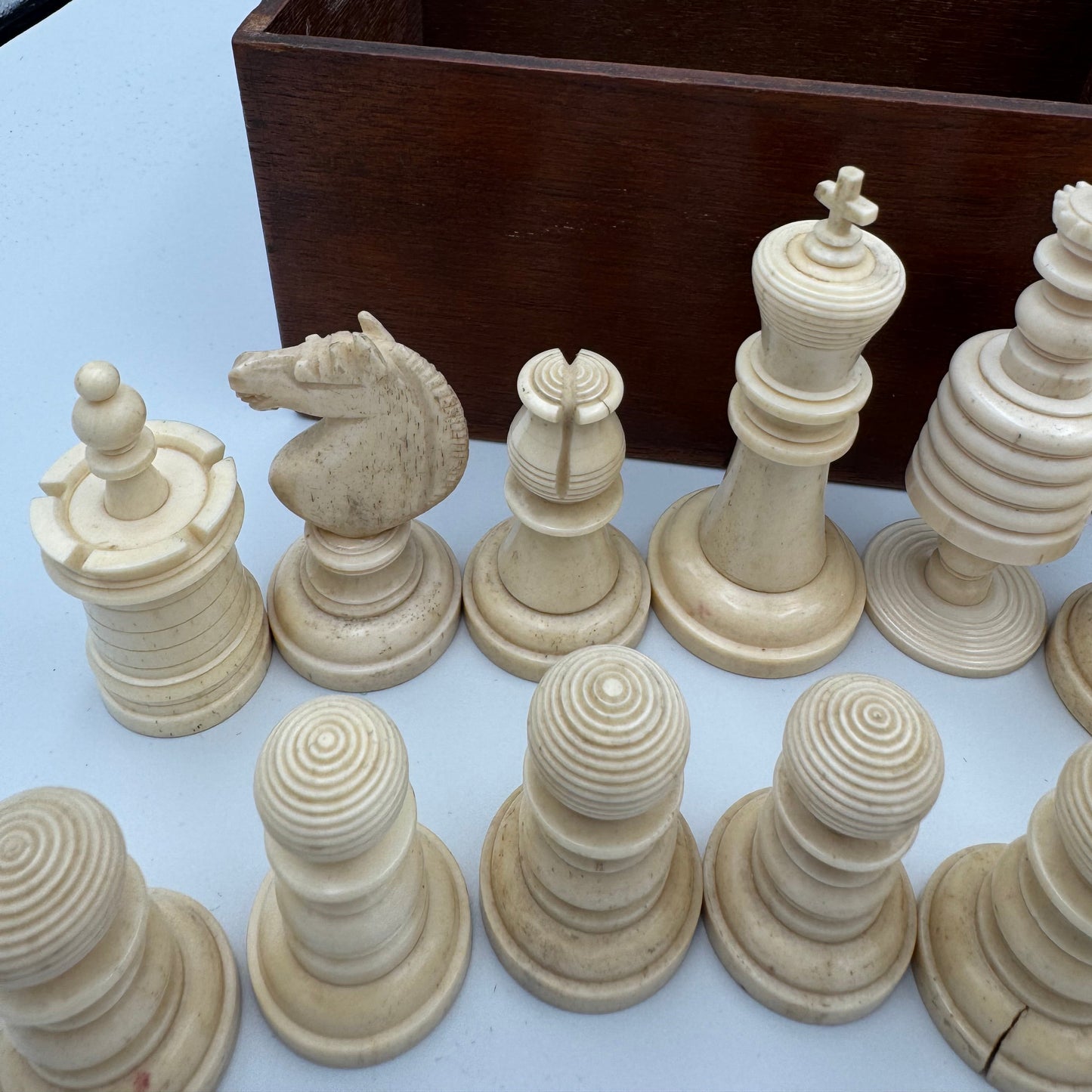 19th century red and cream bone barleycorn chess pieces