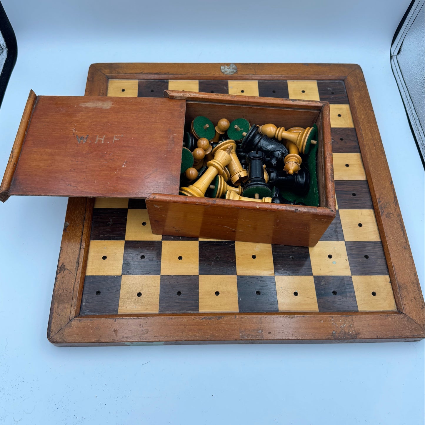 Very rare 1890's Henry Whitty & Son, Jaques & Son of London ship's chess board and pegged pieces.