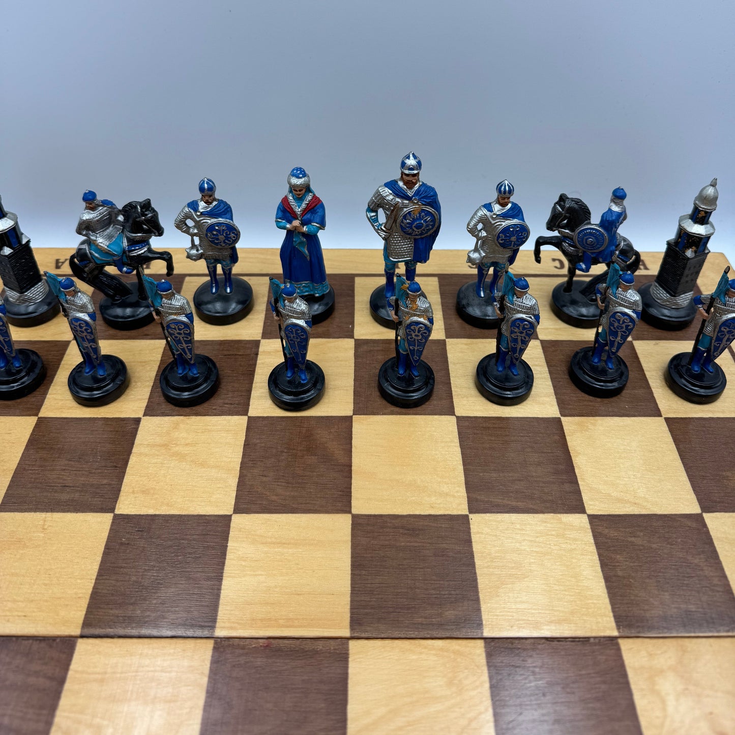Vintage Russian chess set with folding wooden board