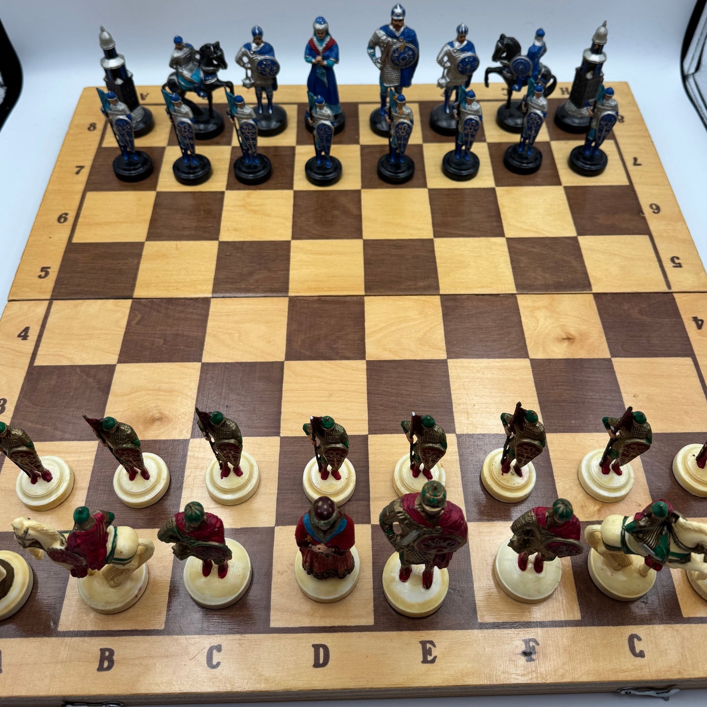 Vintage Russian chess set with folding wooden board