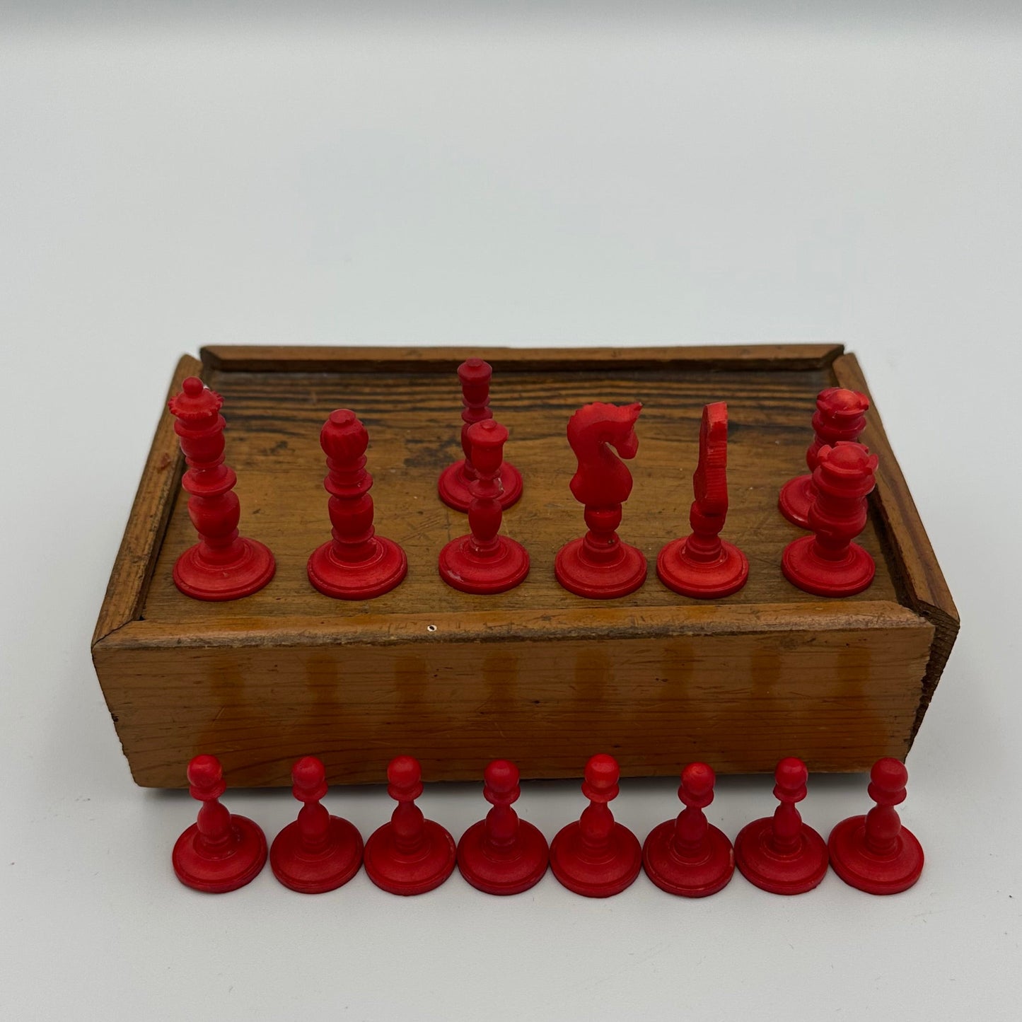 19th century miniature red and cream bone travel chess set