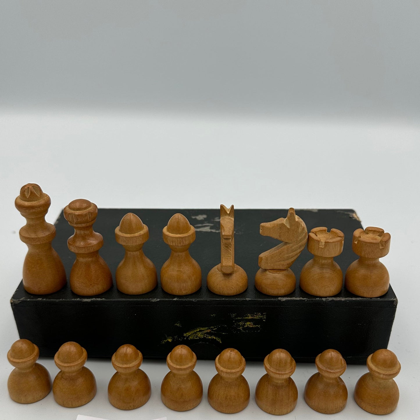Vintage wooden rounded chess pieces