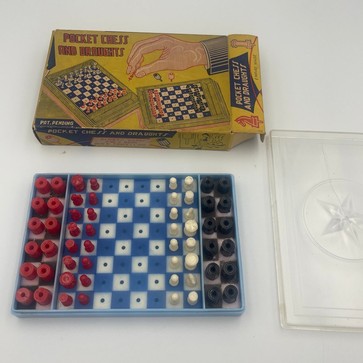 Vintage pocket chess and draughts set in original packaging