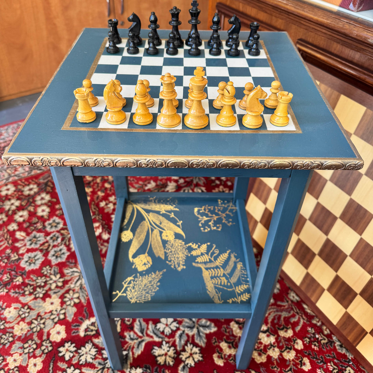 Bespoke hand painted regency style table with chess board top and gold leaf accent shelf
