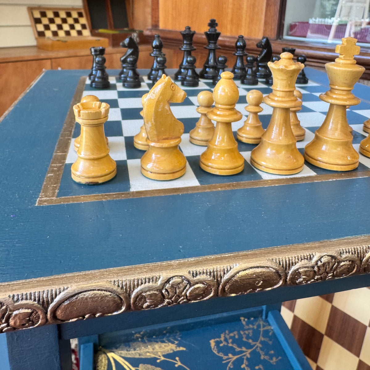 Bespoke hand painted regency style table with chess board top and gold leaf accent shelf