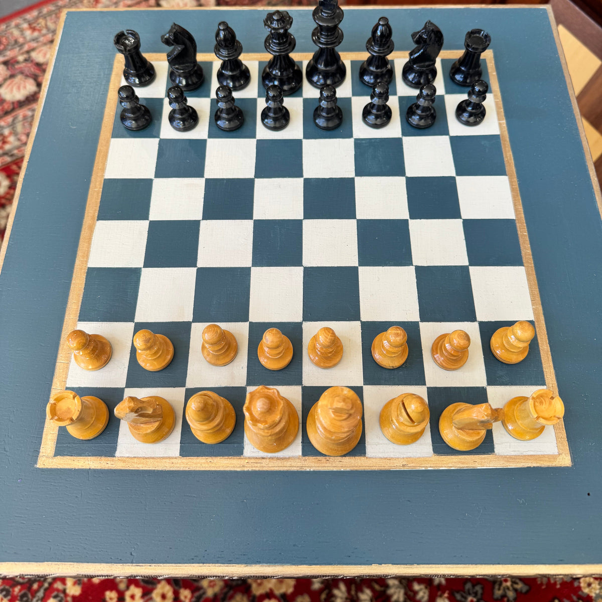 Bespoke hand painted regency style table with chess board top and gold leaf accent shelf