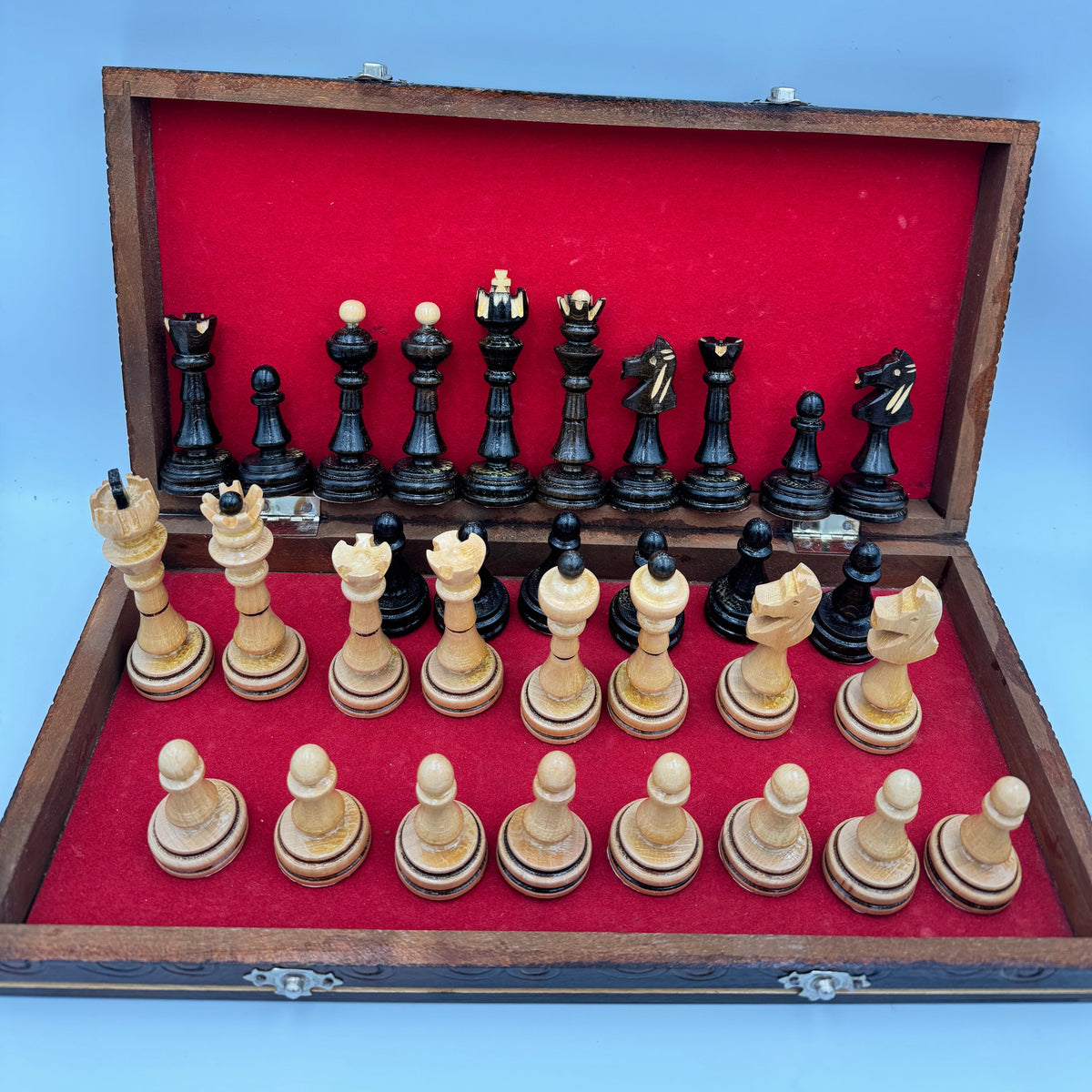 Vintage folding wooden pyrography chess board with hand carved Staunton style pieces