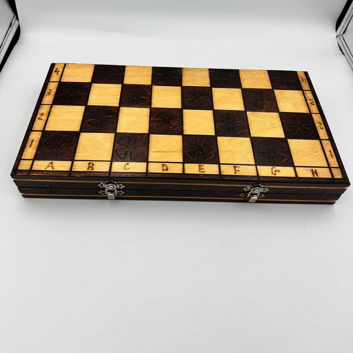 Vintage folding wooden pyrography chess board with hand carved Staunton style pieces