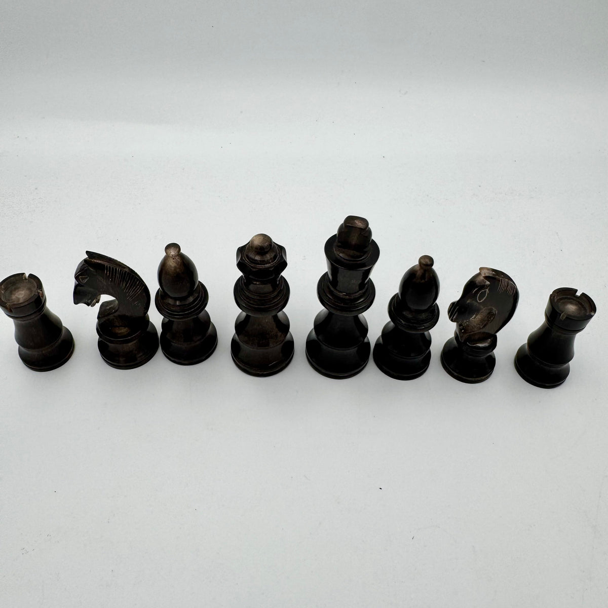 1960's library sized cow horn chess set