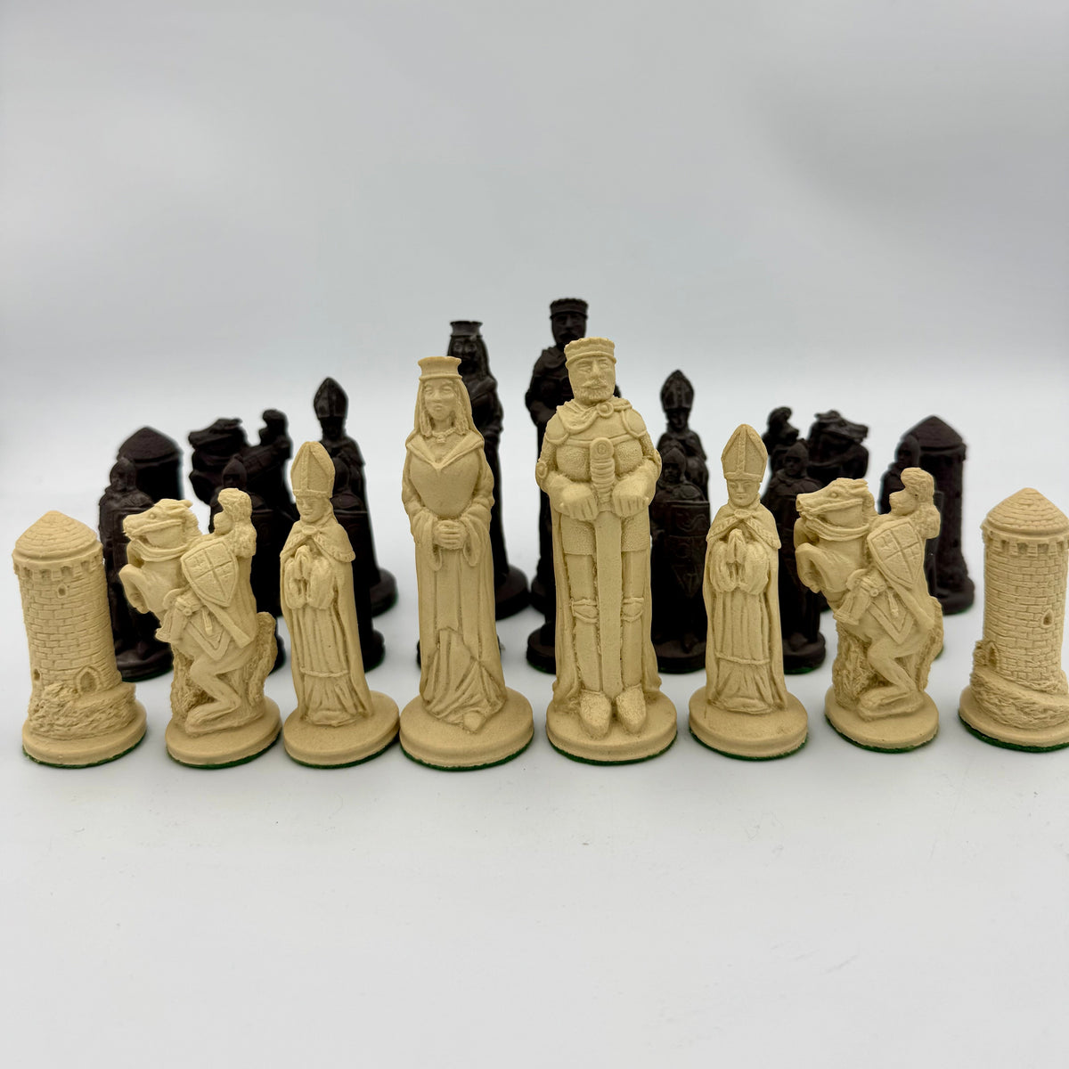 Camelot chess pieces hand carved from Cornish clay and Welsh slate
