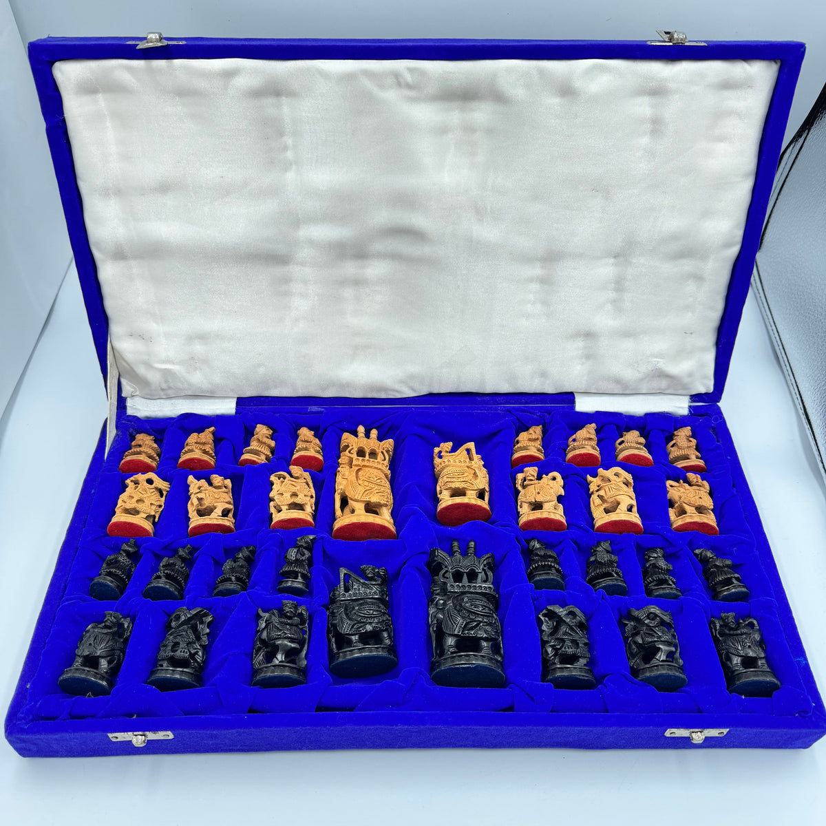 Intricately hand carved Indian sandalwood and ebonised figural "Howdah" chess set circa 1950s-1970s
