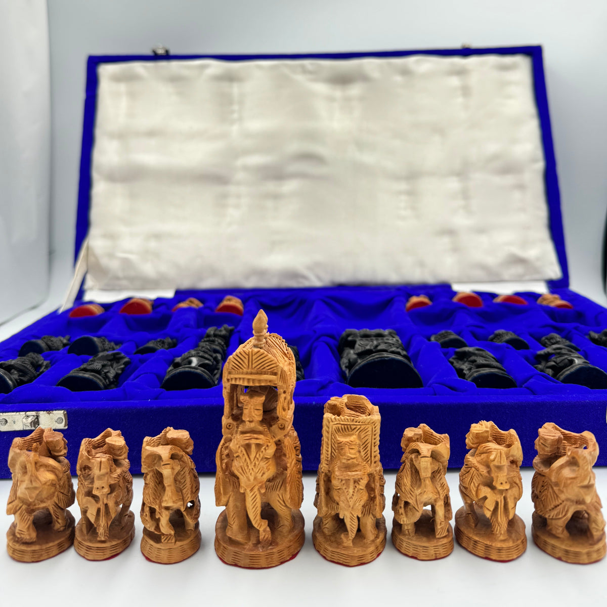 Intricately hand carved Indian sandalwood and ebonised figural "Howdah" chess set circa 1950s-1970s