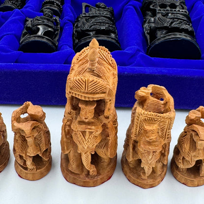 Intricately hand carved Indian sandalwood and ebonised figural "Howdah" chess set circa 1950s-1970s