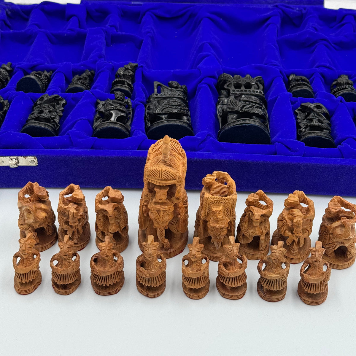 Intricately hand carved Indian sandalwood and ebonised figural "Howdah" chess set circa 1950s-1970s