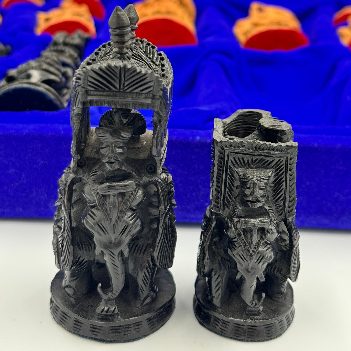 Intricately hand carved Indian sandalwood and ebonised figural "Howdah" chess set circa 1950s-1970s